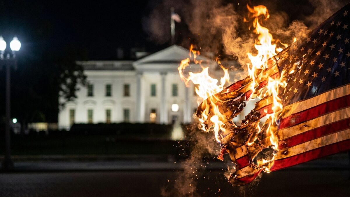 American flag burning White House